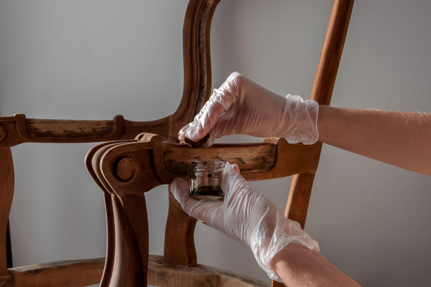 Processing Furniture Stain With A Swab Made Of Lint Free Cloth. All Parts Backrest, Armrest, Leg. Renovation Of Old Furniture As An Antique Victorian Old Wooden Armchair.